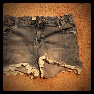 Shorts with white pattern on the bottom